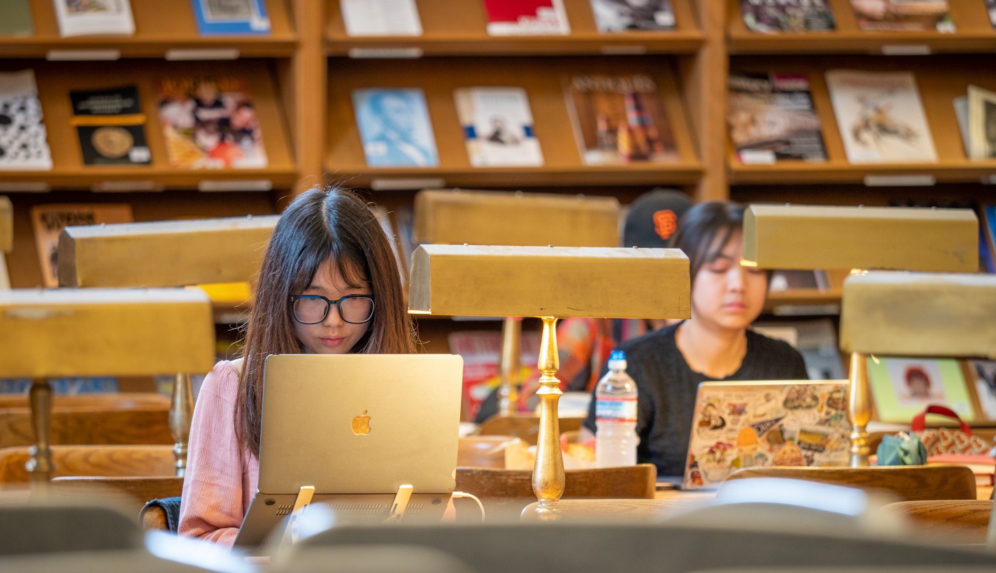 Student studying at a Duke library.
