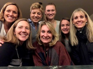 7 women smiling