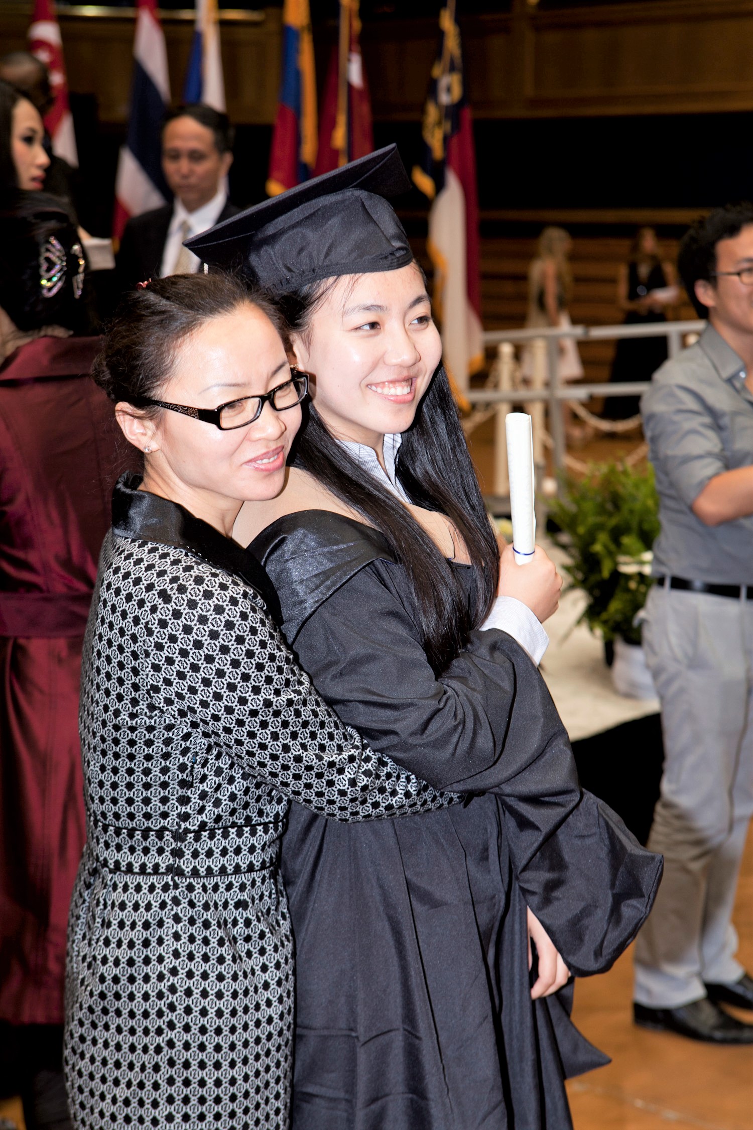 A Fuqua graduate and her mother embrace at the graduation ceremony.