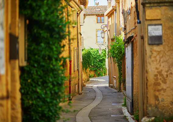 narrow street between buildings