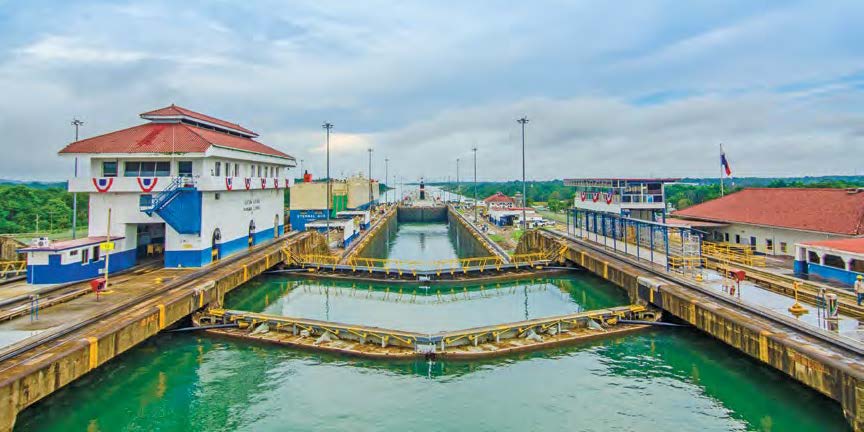 Zodiac canal pictured with buildings on each side and multiple drawbridges.