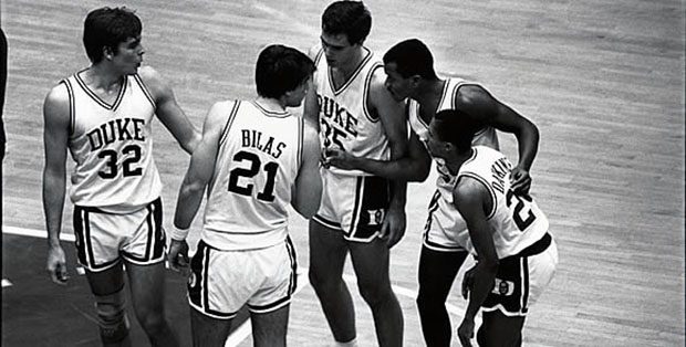 Courting success: Three of the five exemplary 86ers, Mark Alarie (32), Jay Bilas (21), and Johnny Dawkins  (24), during cliffhanger victory against Notre Dame in their senior year (also pictured, freshman Danny Ferry and sophomore Billy King) Photo: Les Todd