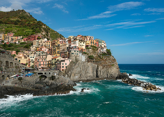 City on side of mountain, above the coast line