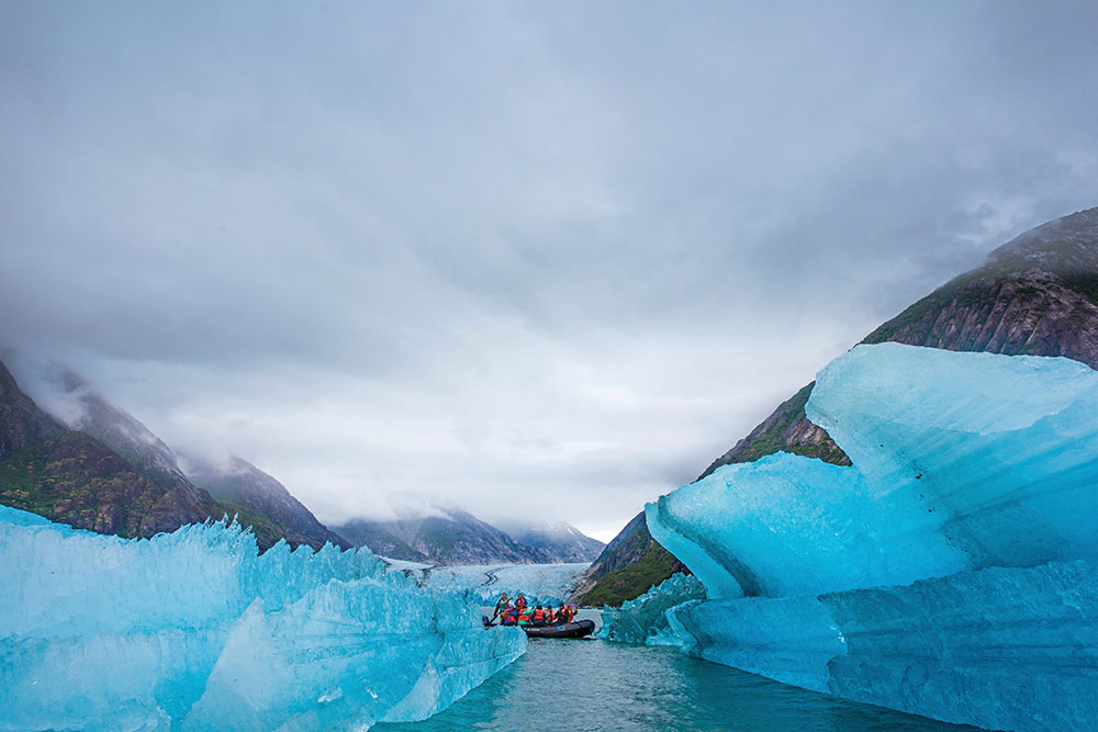 Riding Zodiac through glaciers in Alaska