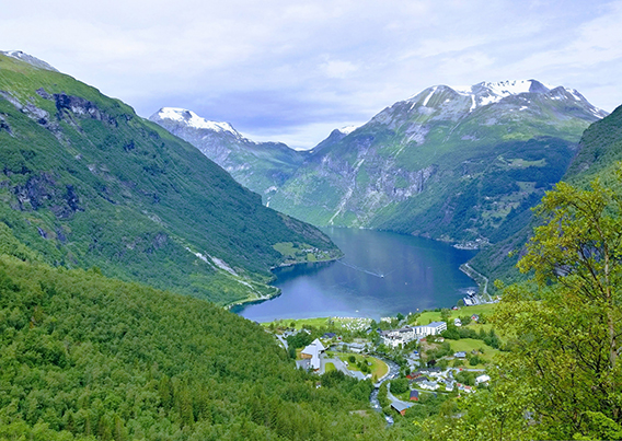 Beautiful valley with lush green mountains.