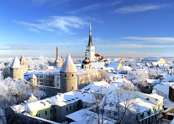 snow covered city with clear blue sky