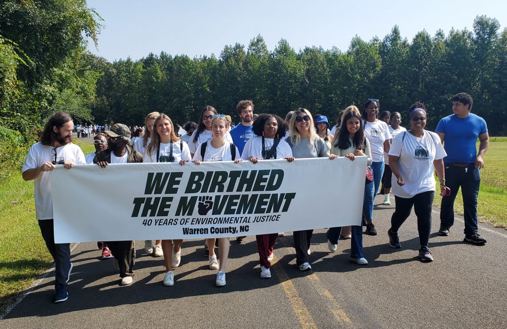 Team members participating in 40th anniversary march for environmental justice in Warren County, NC (Photo: Cameron Oglesby).