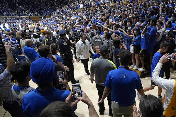 Krzyzewski exits Cameron Indoor Stadium following his final game, against the University of North Carolina, on March 5, 2022.